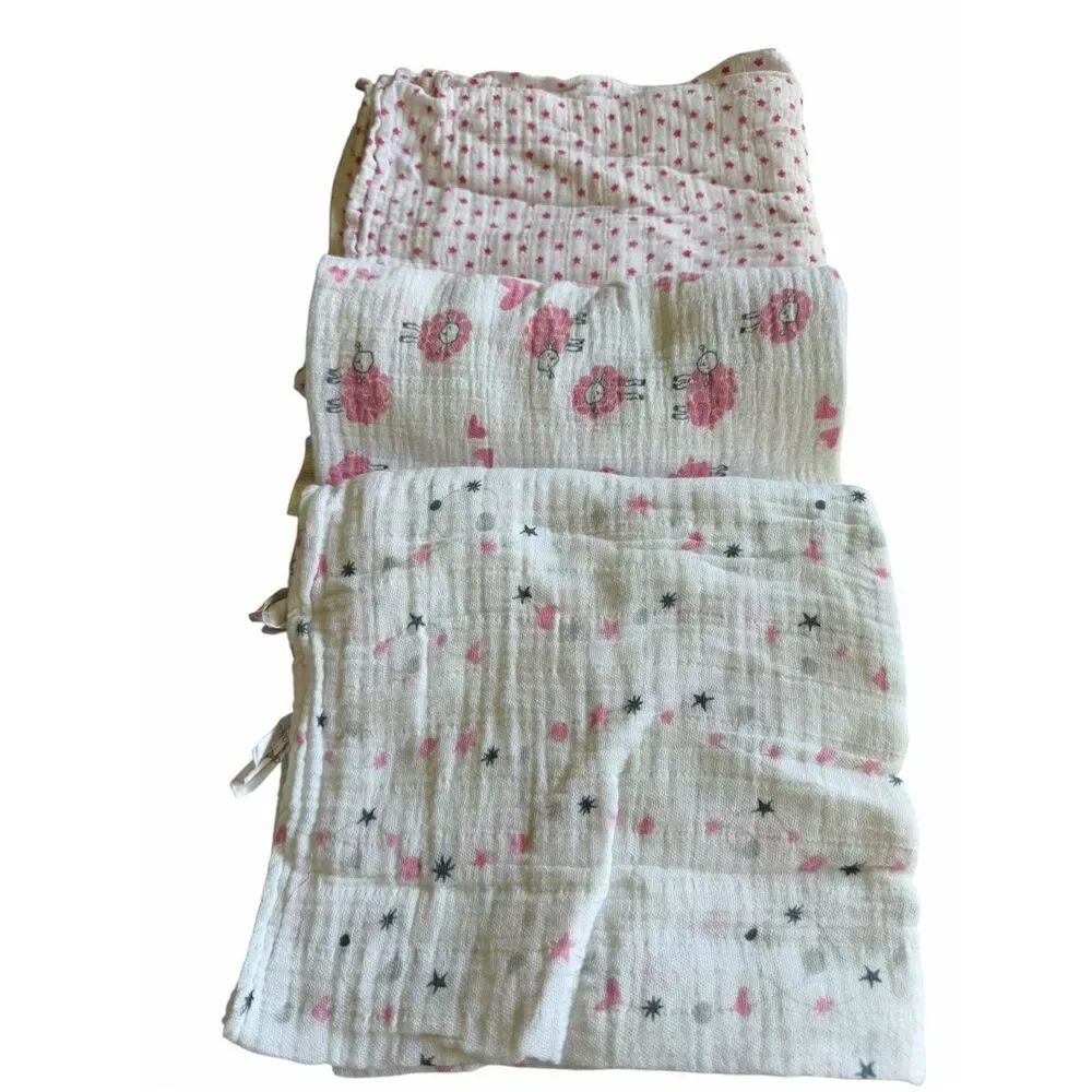 Aden & Anais 7 Blanket Swaddles and a small baby cuddle Pink White